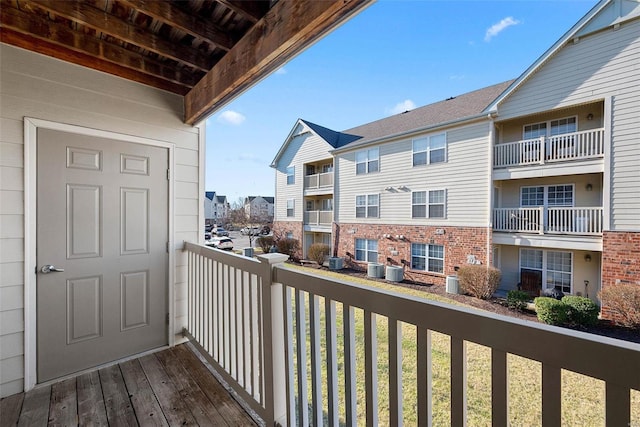 balcony with a residential view and central AC