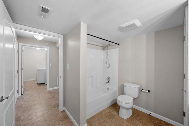 full bathroom with visible vents, washer / dryer, toilet, and baseboards