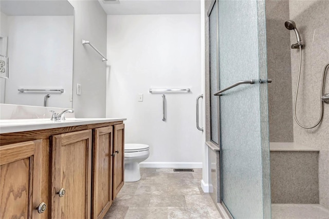 full bathroom featuring a stall shower, baseboards, visible vents, toilet, and vanity