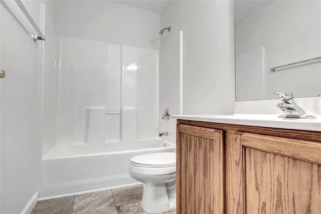 full bathroom featuring toilet,  shower combination, and vanity