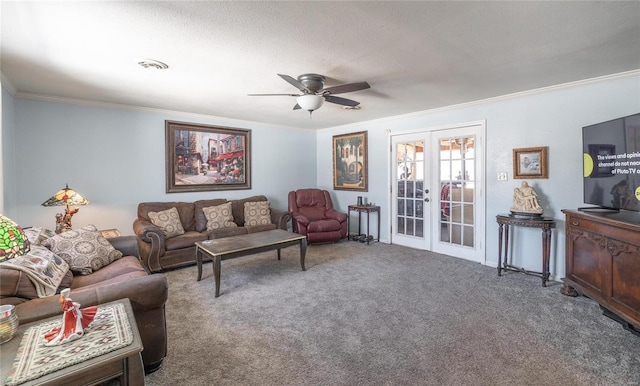 carpeted living room with ceiling fan, french doors, visible vents, and ornamental molding