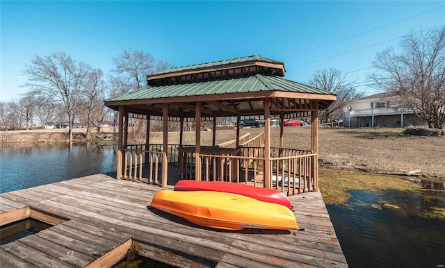 dock area featuring a gazebo and a water view