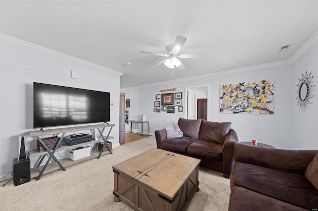 living area featuring light carpet, crown molding, visible vents, and a ceiling fan