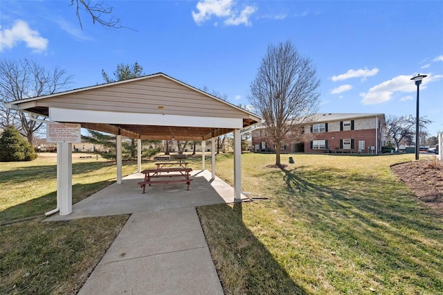 view of community with a lawn and a gazebo