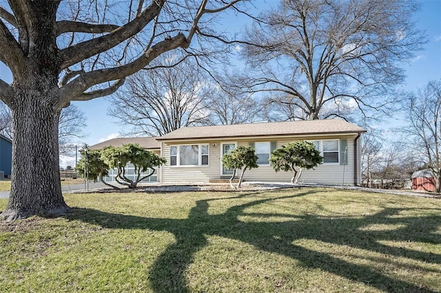 view of front facade with a front yard