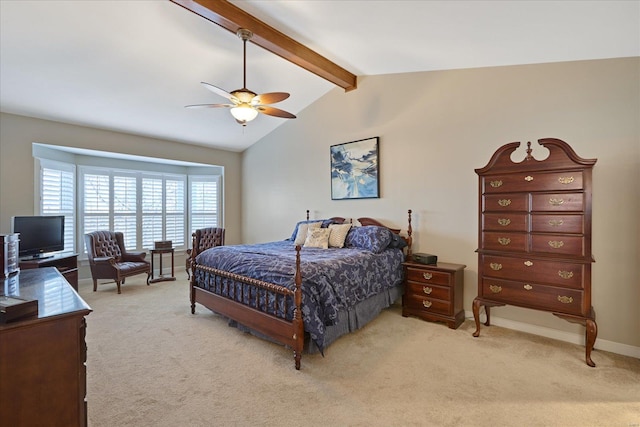 bedroom featuring lofted ceiling with beams, baseboards, a ceiling fan, and light colored carpet