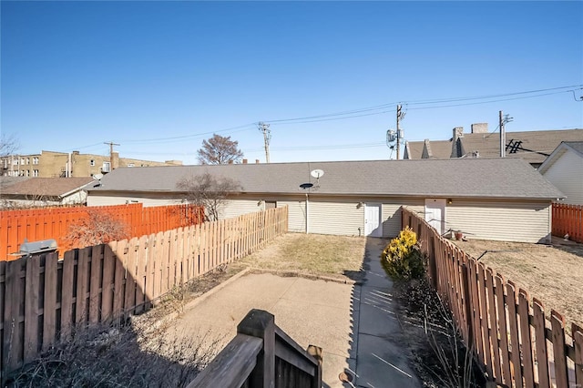 view of yard with a patio area and a fenced backyard