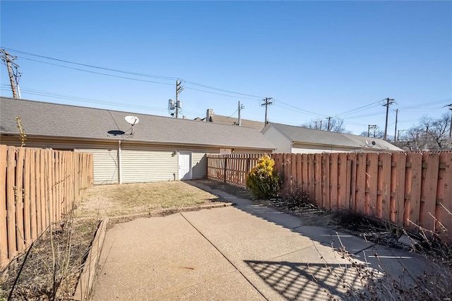 exterior space featuring a fenced backyard