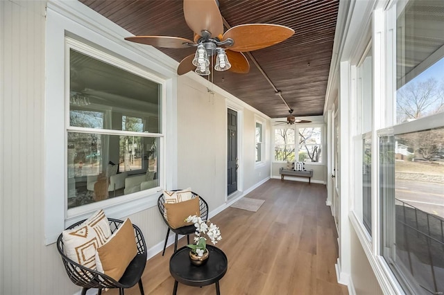 sunroom / solarium with wooden ceiling