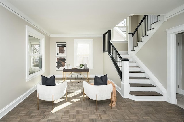 interior space with baseboards, stairs, and a healthy amount of sunlight