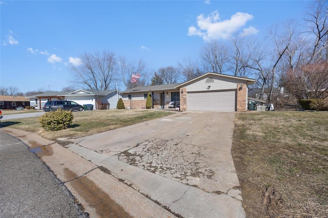 ranch-style house featuring brick siding, a chimney, concrete driveway, a front yard, and a garage