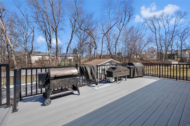 wooden deck with grilling area