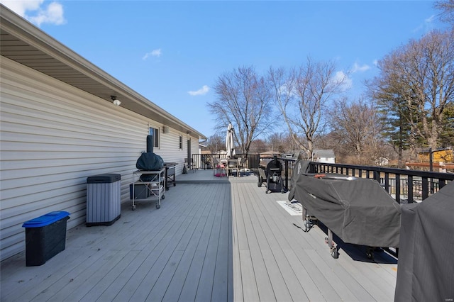 wooden deck with grilling area