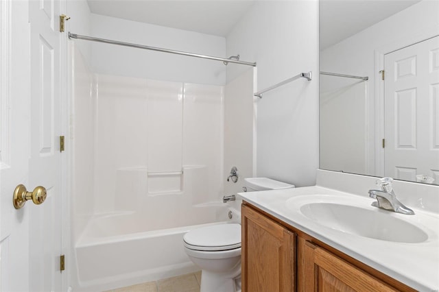 full bathroom with  shower combination, vanity, toilet, and tile patterned floors