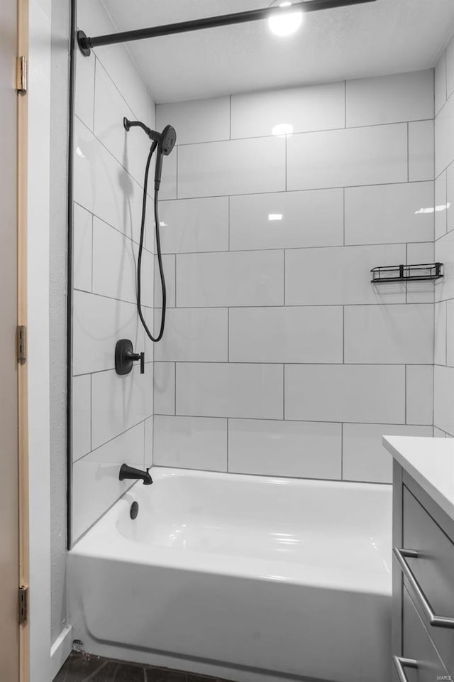 bathroom with vanity and shower / bathtub combination