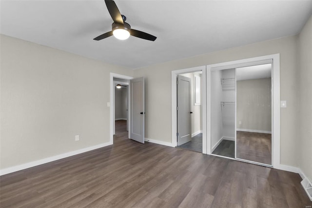 unfurnished bedroom with ceiling fan, a closet, baseboards, and wood finished floors