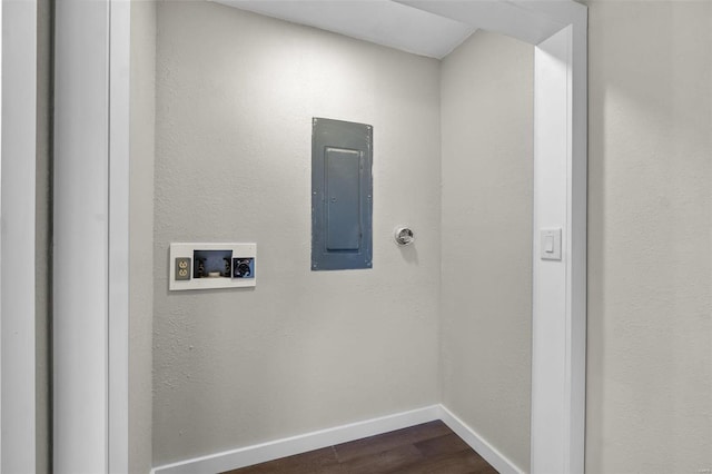 laundry room featuring laundry area, washer hookup, baseboards, electric panel, and dark wood finished floors