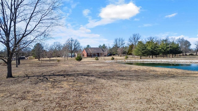 view of yard featuring a water view