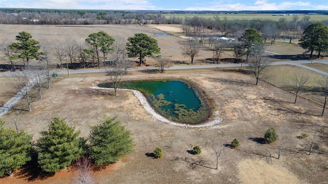 birds eye view of property featuring a water view and a rural view