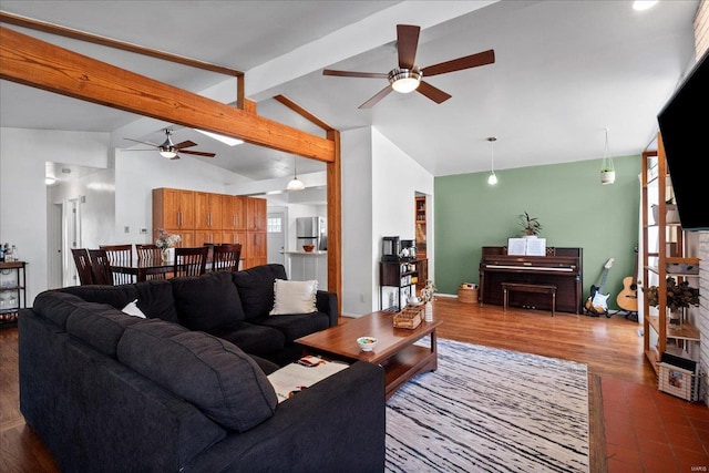 living room with lofted ceiling with beams, wood finished floors, and ceiling fan