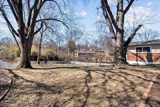 view of yard with fence