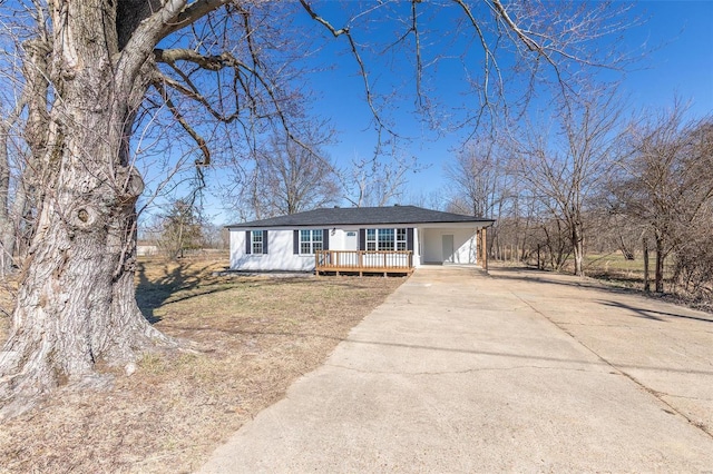 view of front of home with concrete driveway