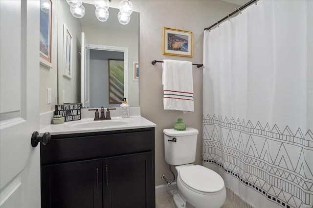 bathroom with a shower with shower curtain, vanity, and toilet