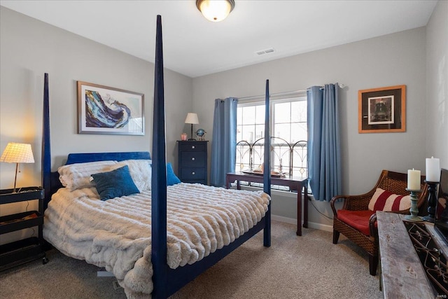 bedroom featuring carpet floors, visible vents, and baseboards