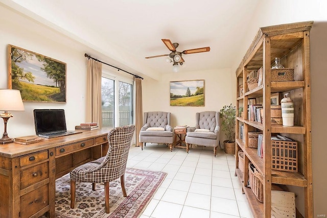 office area with light tile patterned floors and ceiling fan