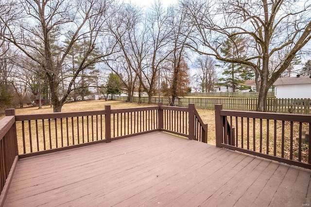 deck with a fenced backyard