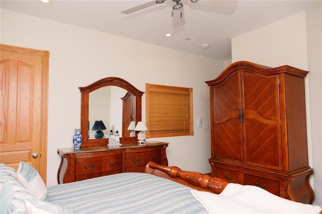 bedroom with ceiling fan and recessed lighting