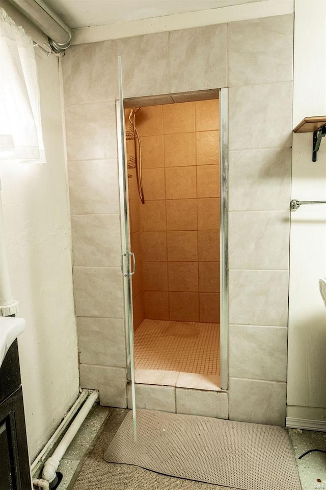 bathroom featuring a stall shower