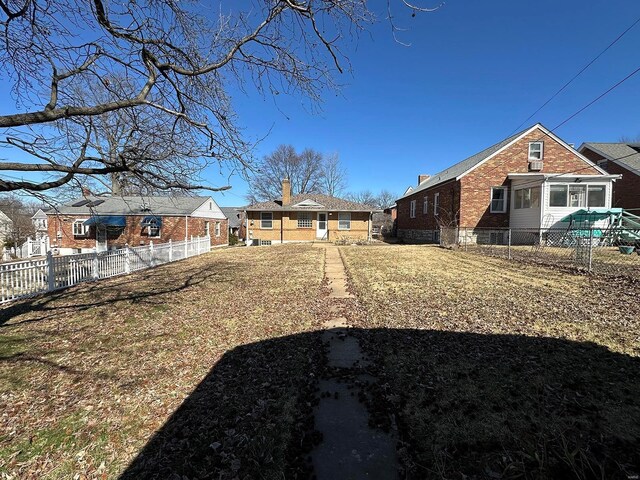 view of yard with fence