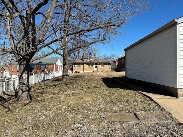 view of yard with fence