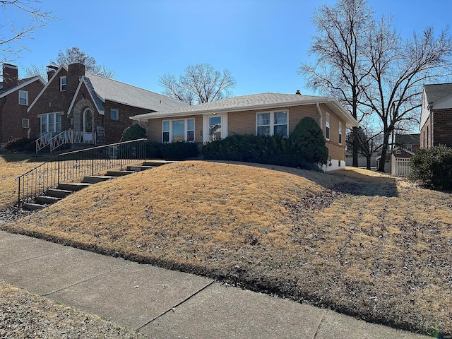 view of front of property with brick siding