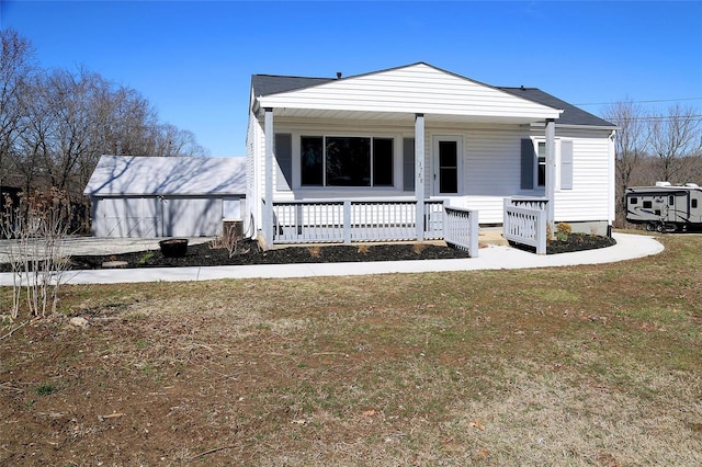 view of front of property with a front lawn and a porch