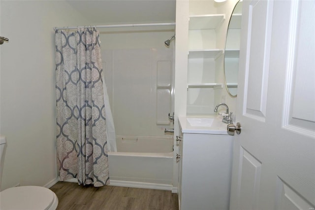 full bath with vanity, shower / bath combo, wood finished floors, and toilet