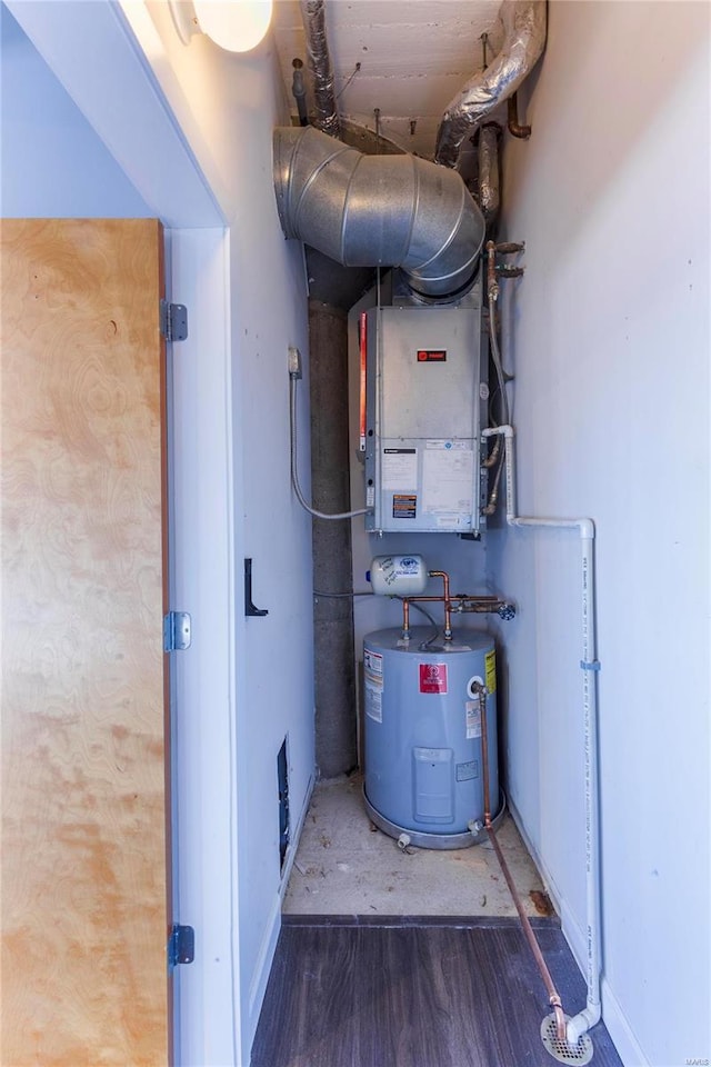 utility room featuring electric water heater