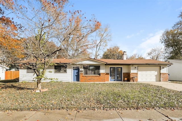 single story home featuring an attached garage, brick siding, fence, concrete driveway, and a chimney