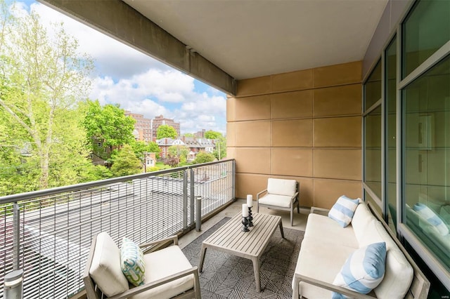 balcony with an outdoor hangout area