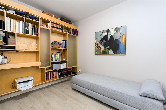 bedroom featuring wood finished floors