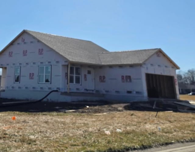 property under construction with a garage