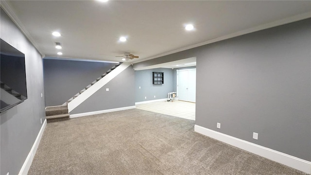 finished below grade area featuring carpet, recessed lighting, ornamental molding, baseboards, and stairs