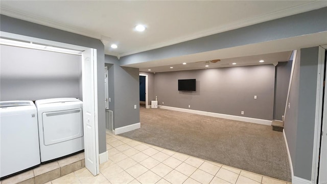 finished basement with light carpet, independent washer and dryer, baseboards, and recessed lighting