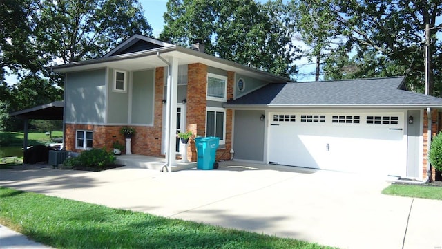 view of front facade with brick siding, a chimney, a shingled roof, concrete driveway, and a garage