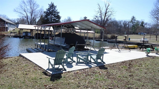 dock area featuring a water view and boat lift