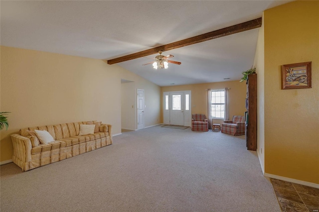 unfurnished living room with vaulted ceiling with beams, carpet flooring, a ceiling fan, and baseboards