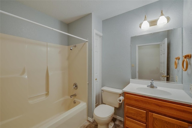 full bathroom featuring  shower combination, vanity, and toilet