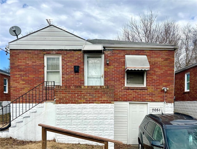 view of front of property with brick siding