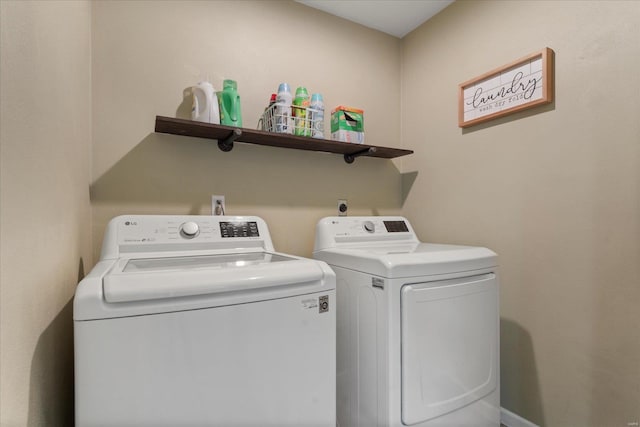 laundry area featuring laundry area and washer and clothes dryer